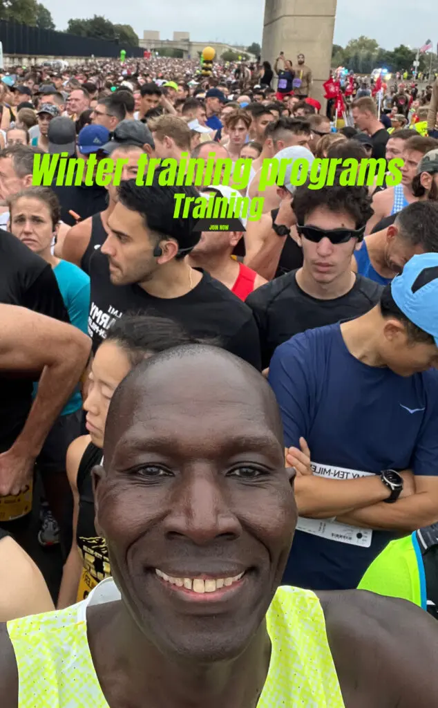 A group of runners gathered at the start of a winter training program race.